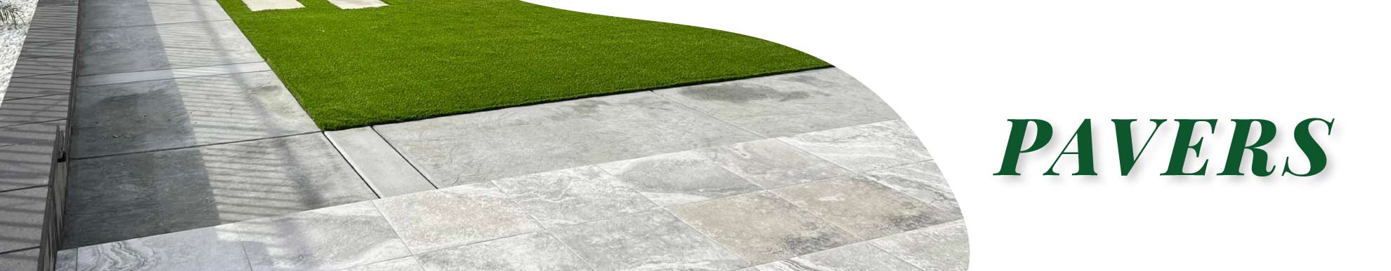 Premium stone walkway pavers paired with artificial grass installation highlighting durable residential hardscape design for homeowners in Sacramento.