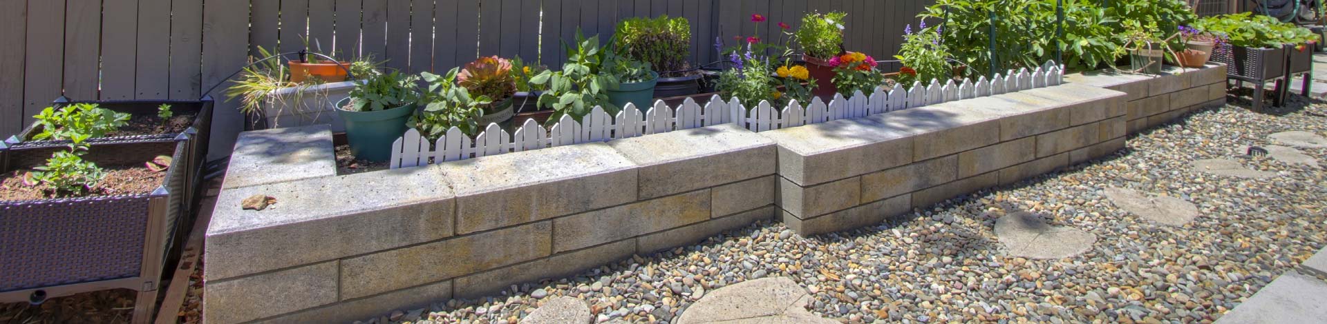 Add depth, structure, and value to your landscape with custom-engineered retaining walls. Perfect for managing slopes, preventing erosion, and creating beautiful terraced garden beds, these walls combine heavy-duty structural integrity with elegant stone aesthetics.